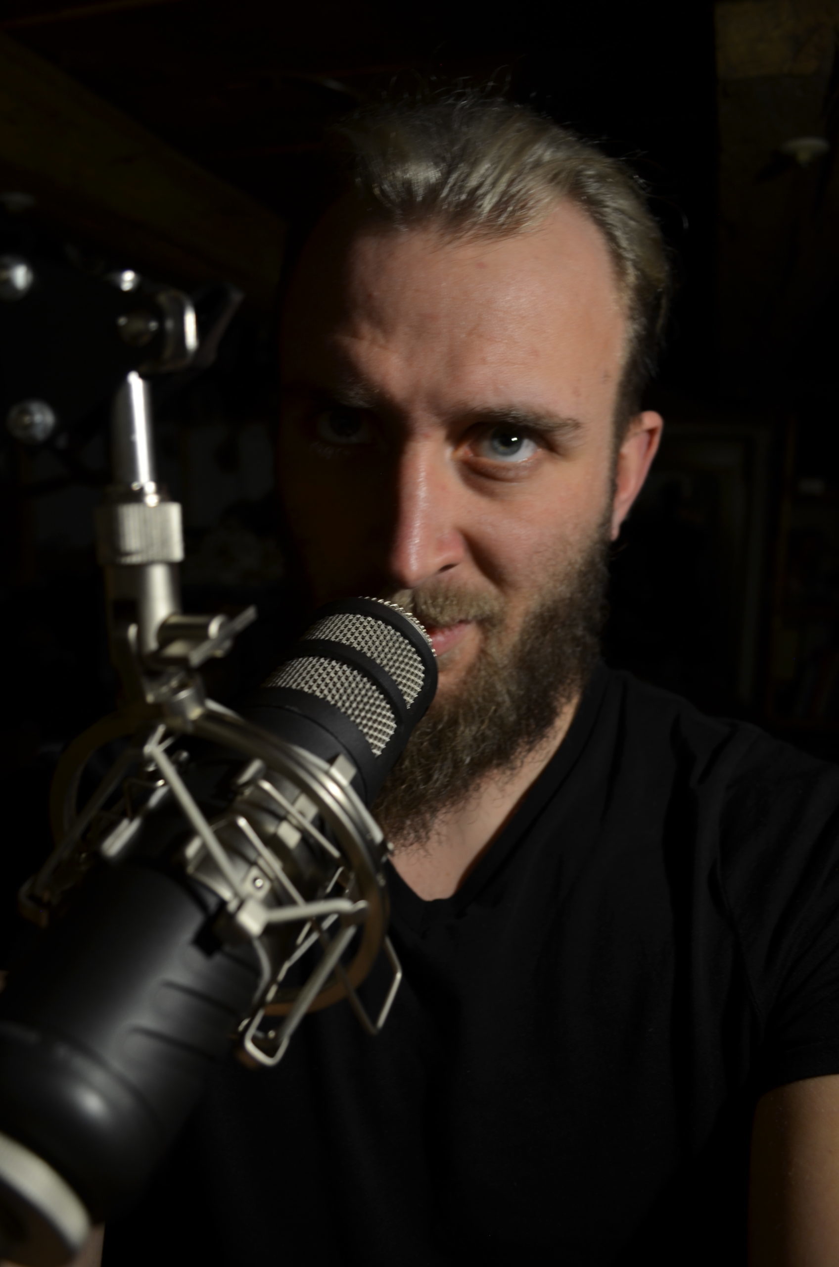 Kim Gjarmati at the microphone in his recording studio